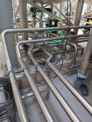fully automated pigging and liquid product distribution system