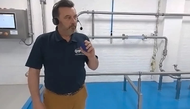 Gilbert giving a demo to customers